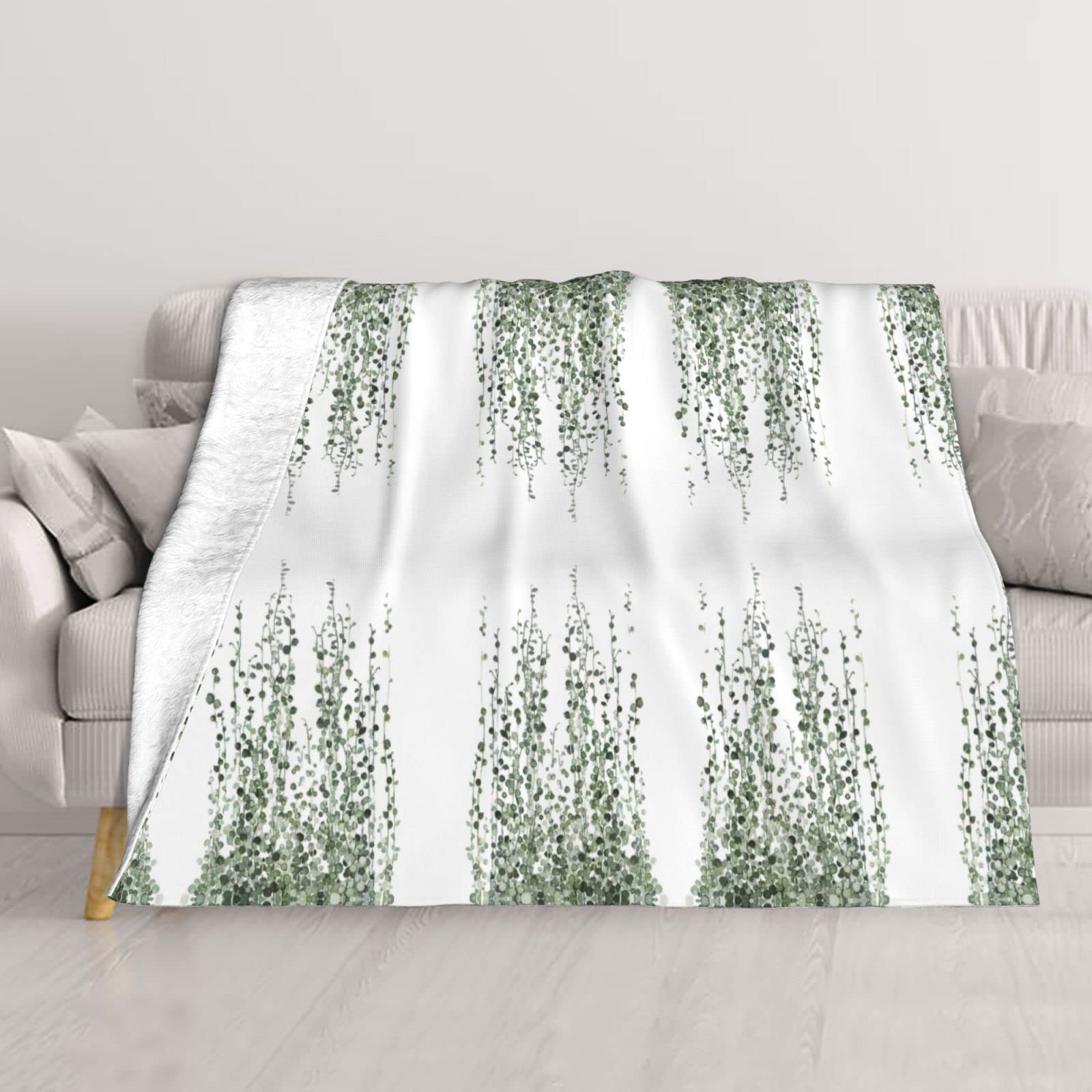Couverture thermique légère toutes saisons pour réguler le sommeil sur le lit