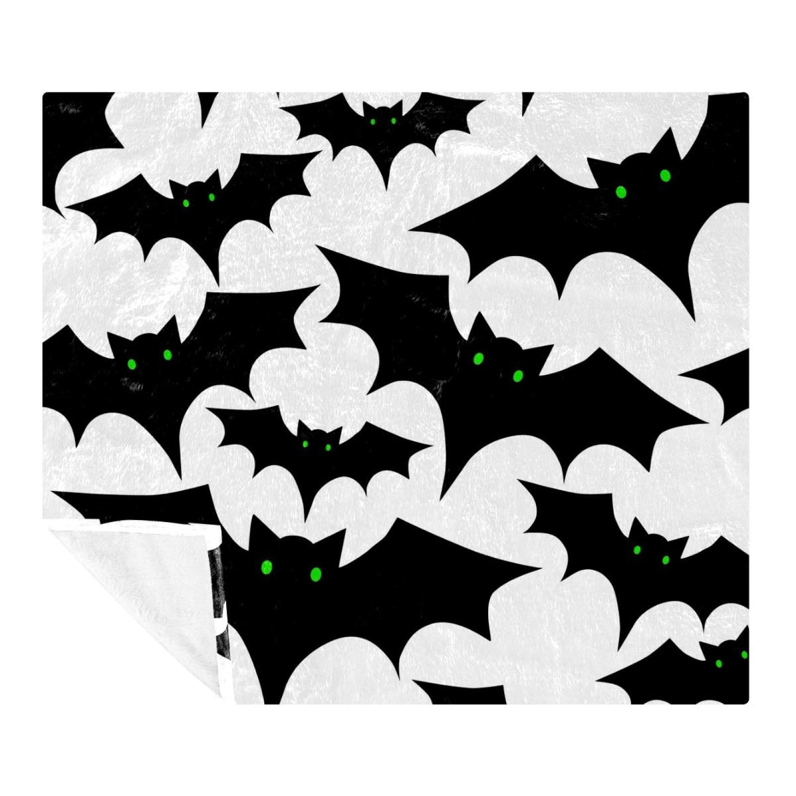 Couverture d'Halloween chauve-souris pour des soirées télé cocooning sur le canapé