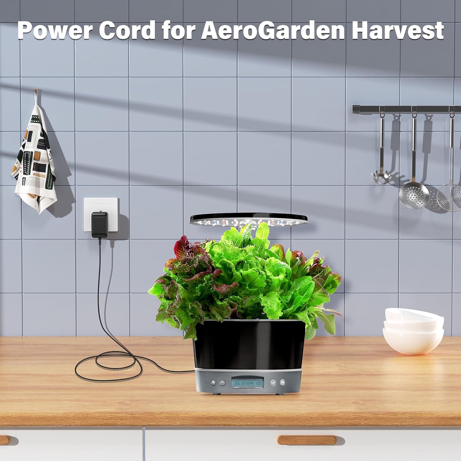 Image showing the power cord connected to an AeroGarden Harvest device and plugged into a wall outlet