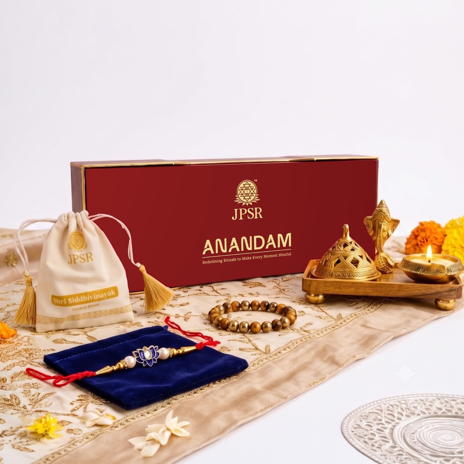 Anandam Rakhi Gift Hamper for Brother | Traditional Rakhi Set | Raksha Bandhan Gift Combo with Complimentary Designer Rakhi Tiger Eye Bracelet Brass Dhoop Burner Ganesh Idol | By RAMALAYA-image-33