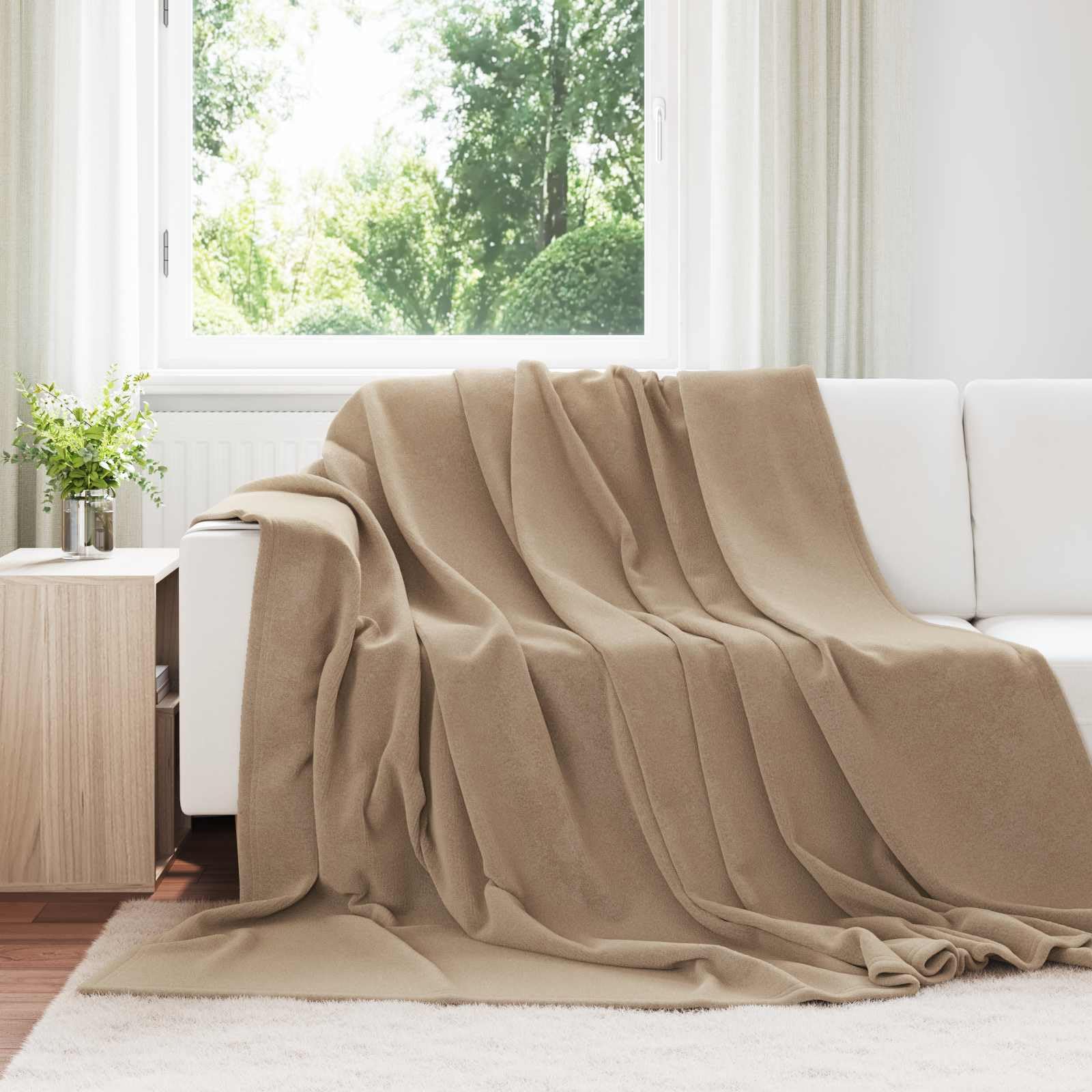 Manta para dormitorio de invierno ideal para las tardes de lectura en el sofá
