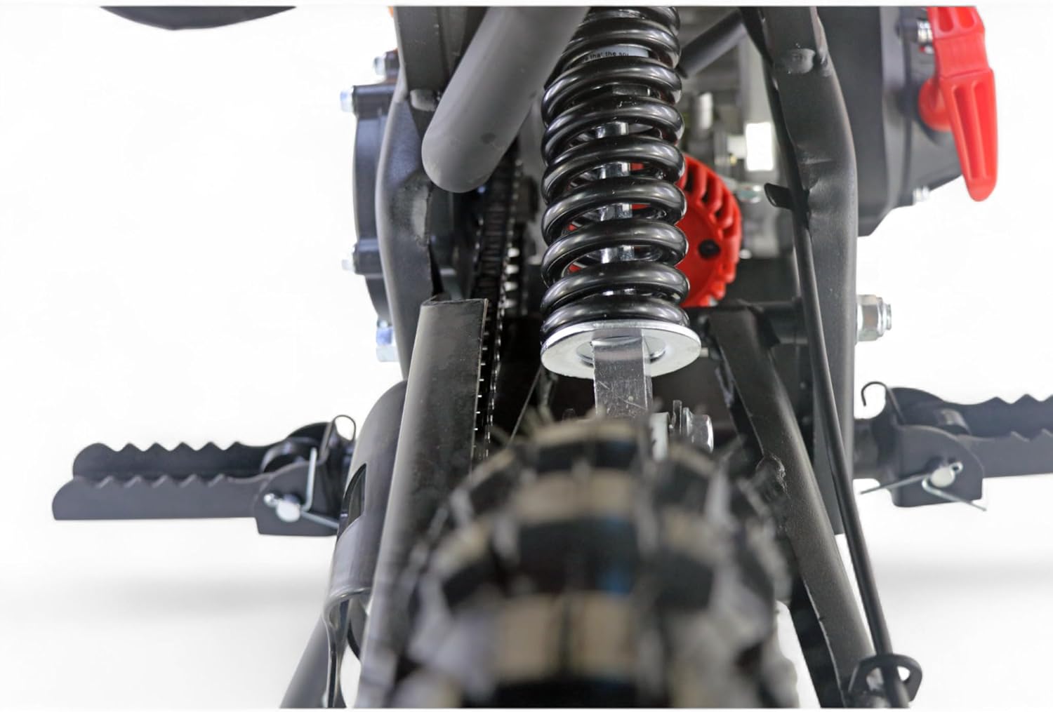 Close-up of KXD 703A rear suspension and chain