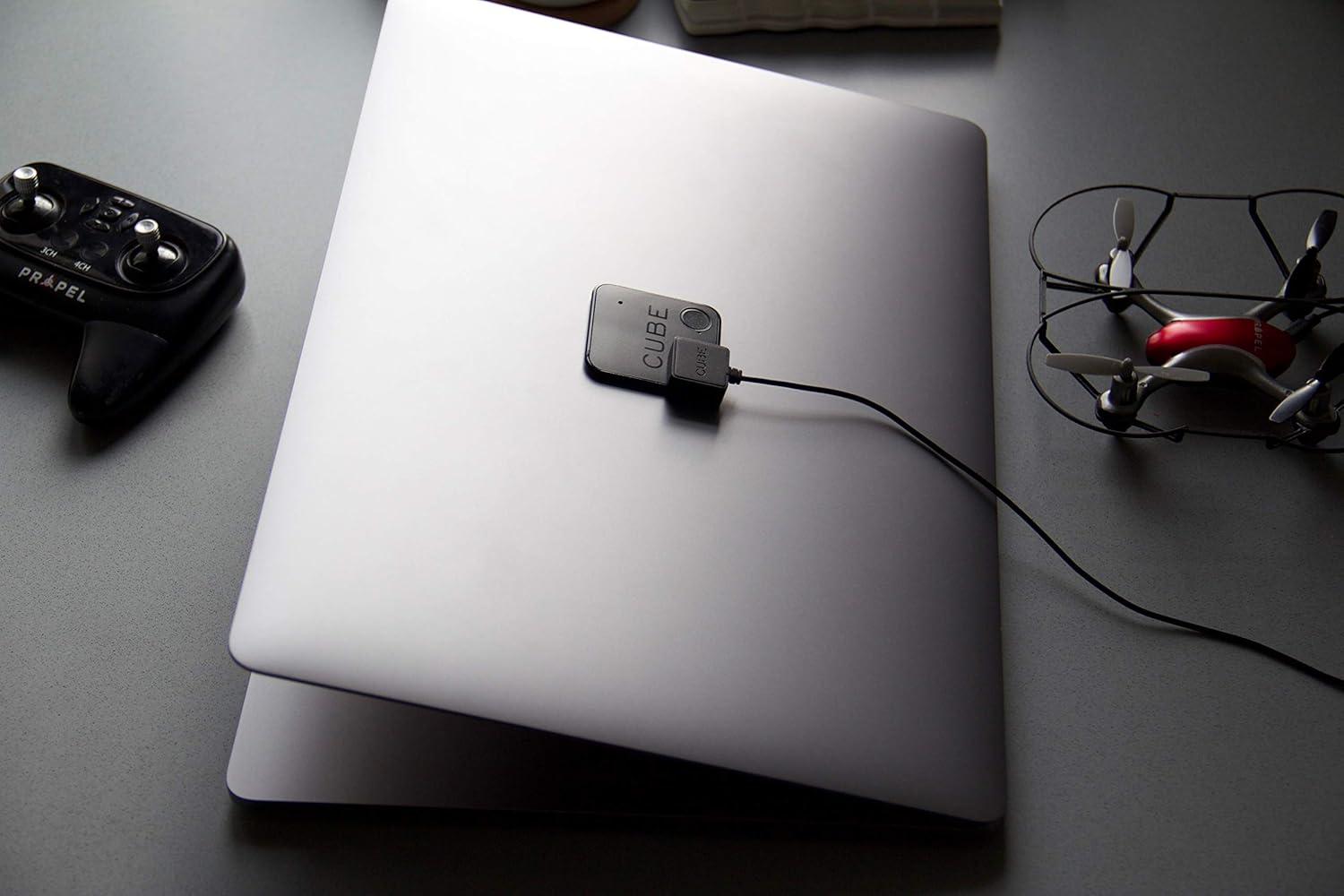 CUBE Shadow charging on a laptop