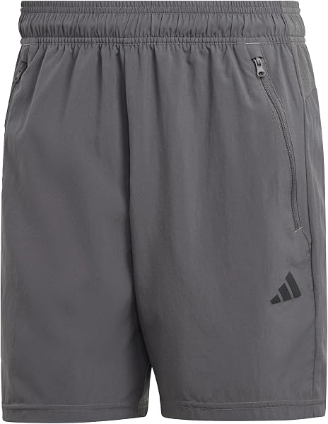 Primer plano del tejido ligero y la cintura elástica de los shorts Adidas Train Essentials Woven.