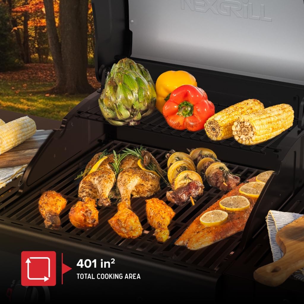 Nexgrill 2-Burner Gas Grill with various foods cooking on the grates