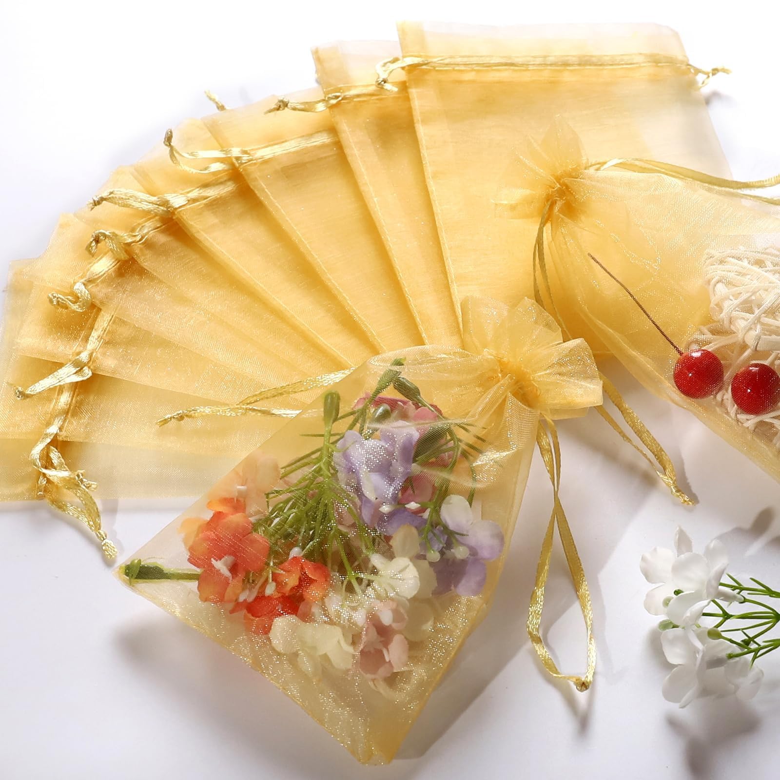 Swastikart10X14 Cms Return Gift Favors Organza Bags Shagun Potli Bags Wedding Party Favors Jewellery Packing Pouch Dry Fruit Pouch Sheer Candy Pouches Net Tissue Bags (Colour - Gold) Pack of 25