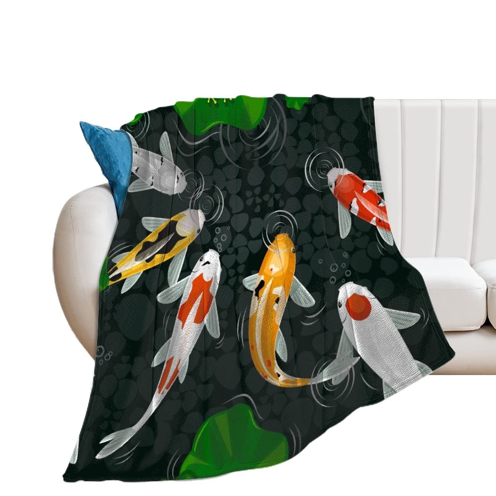 Couverture en flanelle poisson rouge contre le froid hivernal sur le lit