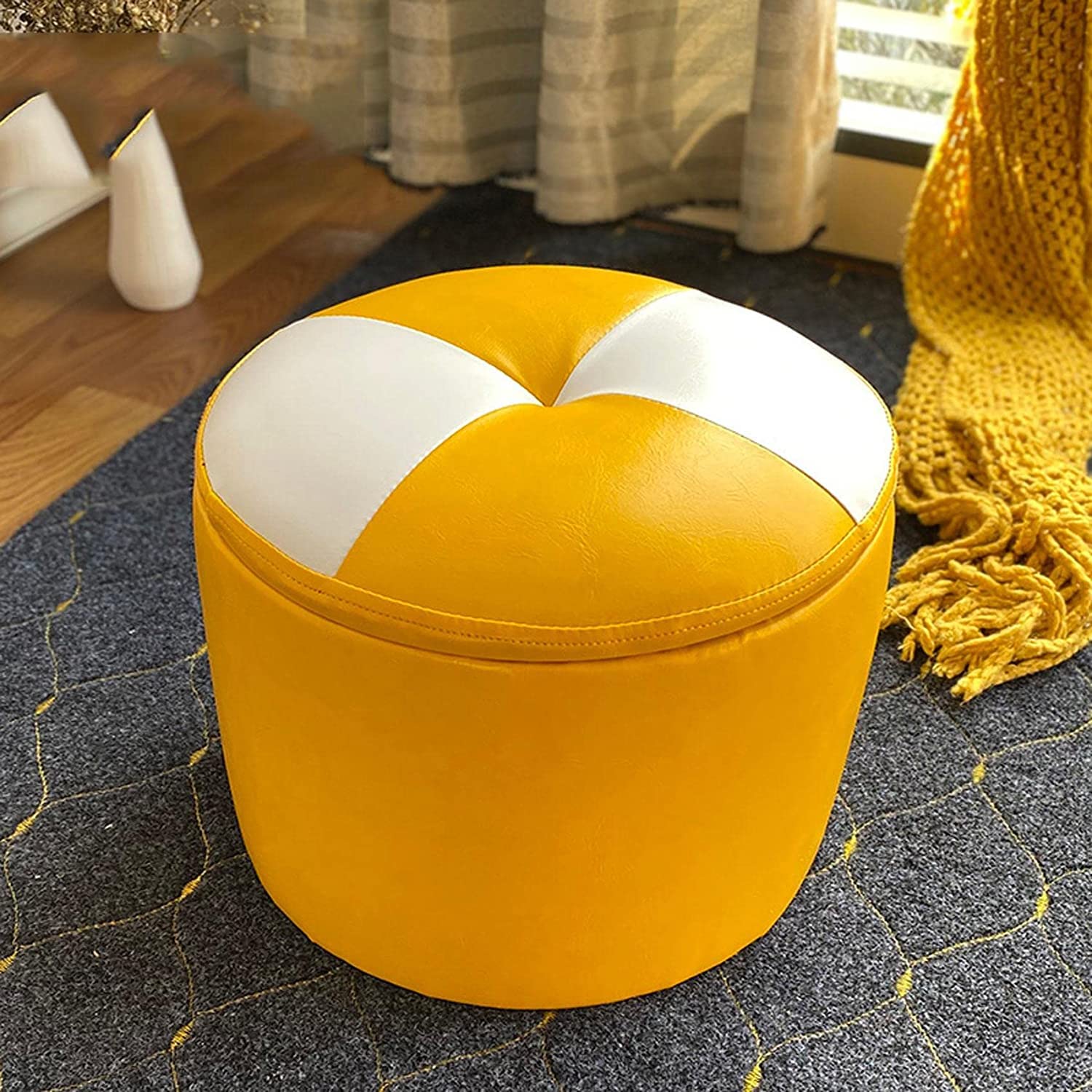 Repose-pieds tabouret rond pour optimiser l'espace et ranger la chambre
