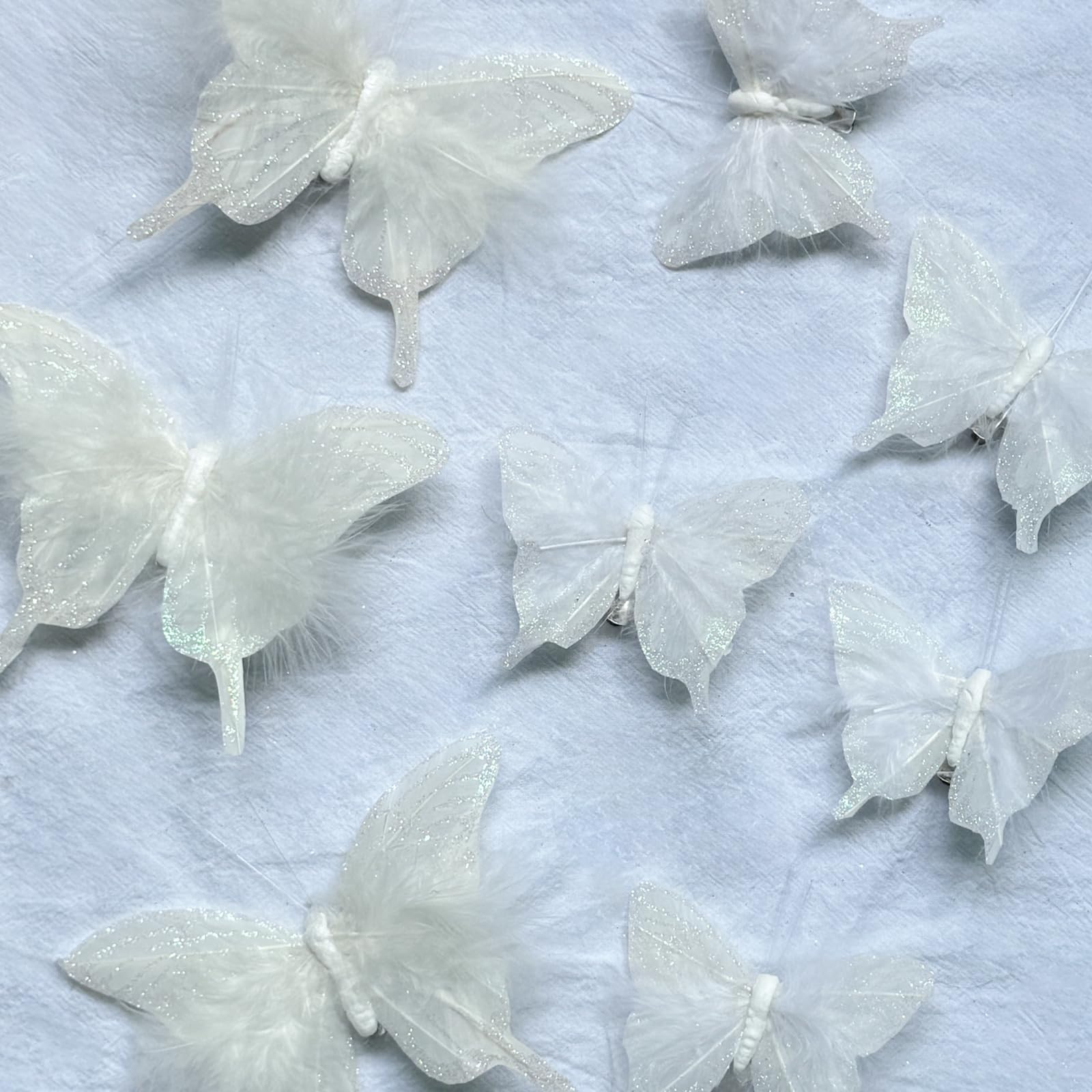 Photo 1 of 12PCS White Feather Butterfly Glitter Butterflies Decor with Clip for Christmas Tree Wreaths Garden Decorations (White)