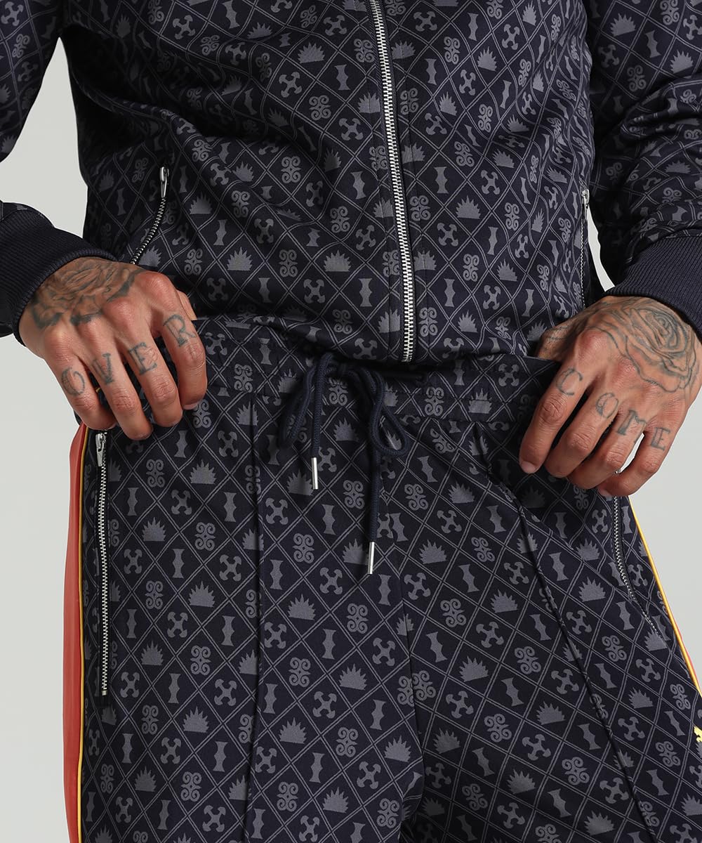 PUMA Pantalones de chándal Holgados y Estampados Road To Unity Hombre