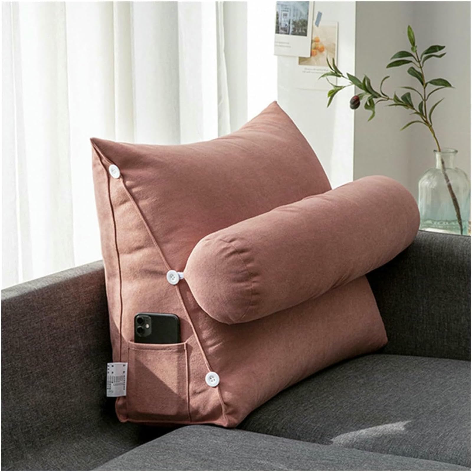 Oreiller triangulaire pour soulager le dos pendant la lecture au lit