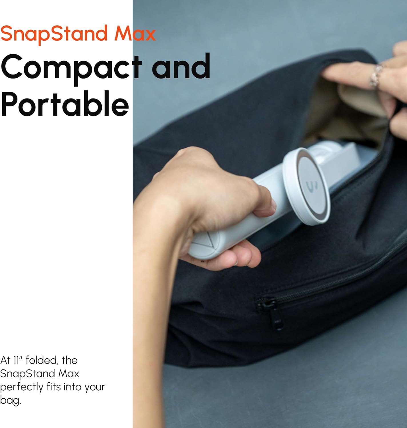 A hand holding the ShiftCam Bluetooth remote control, demonstrating its use for capturing photos.