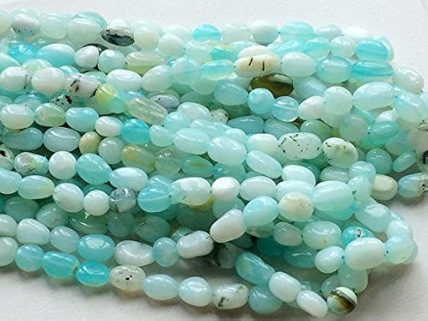Gemme opale bleue de qualité supérieure en perles ovales pour bijoux haut de gamme