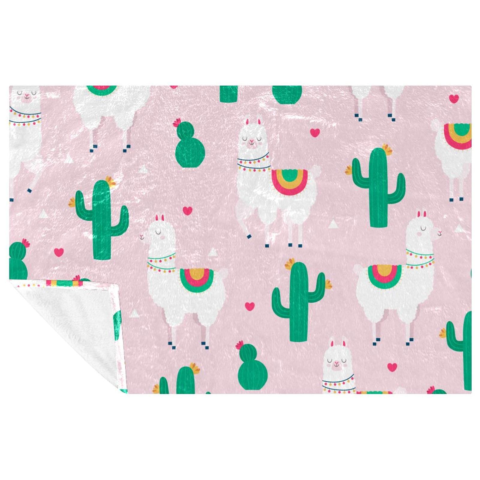 Couverture douce motif alpaga pour des instants cocooning au lit