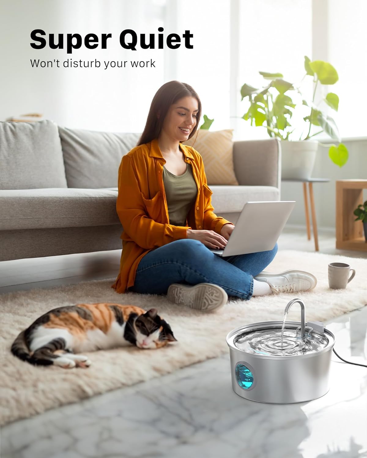 Person working quietly with a cat and the FOFNON Cat Water Fountain nearby