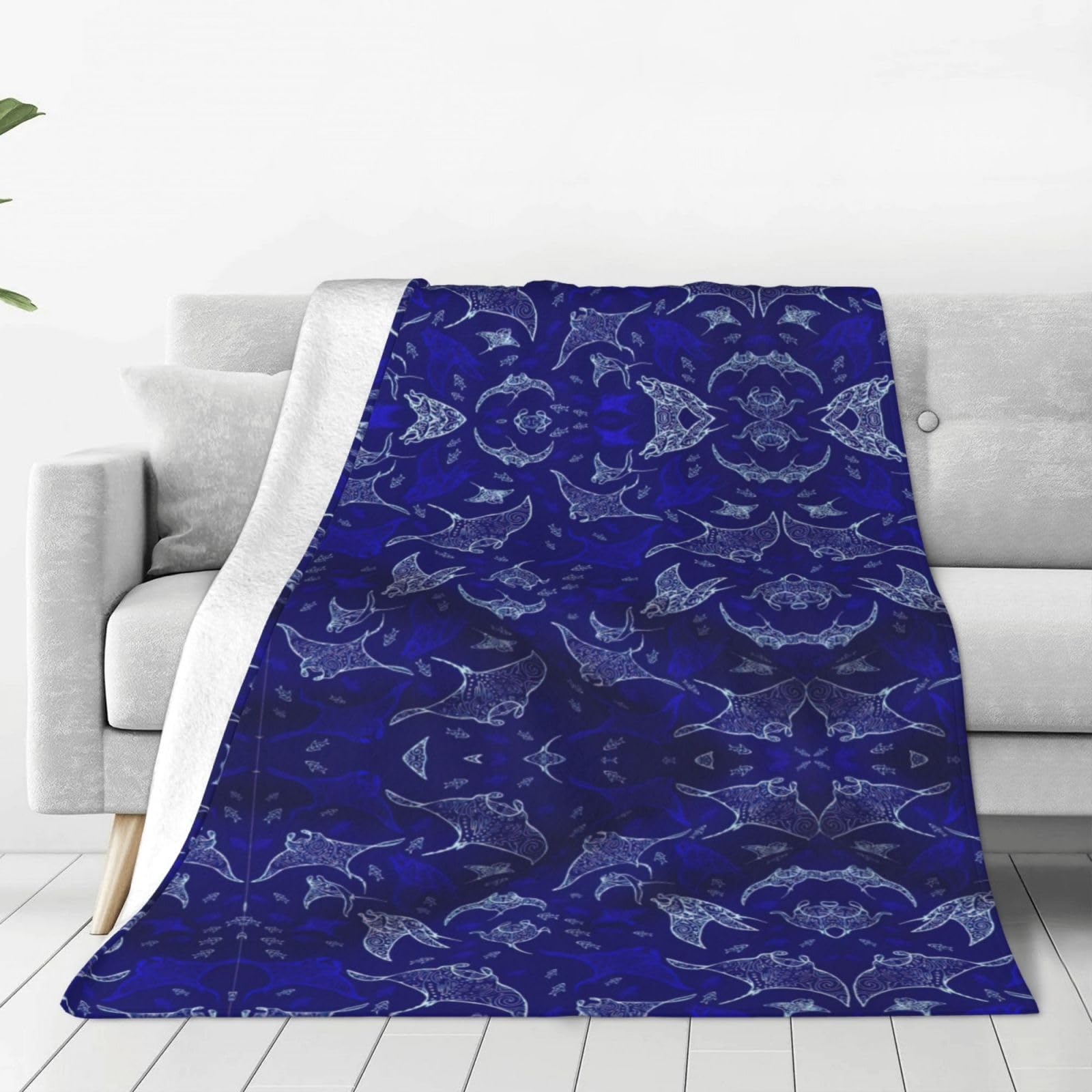 Couverture en flanelle douce pour des soirées cocooning chaleureuses sur votre canapé du salon