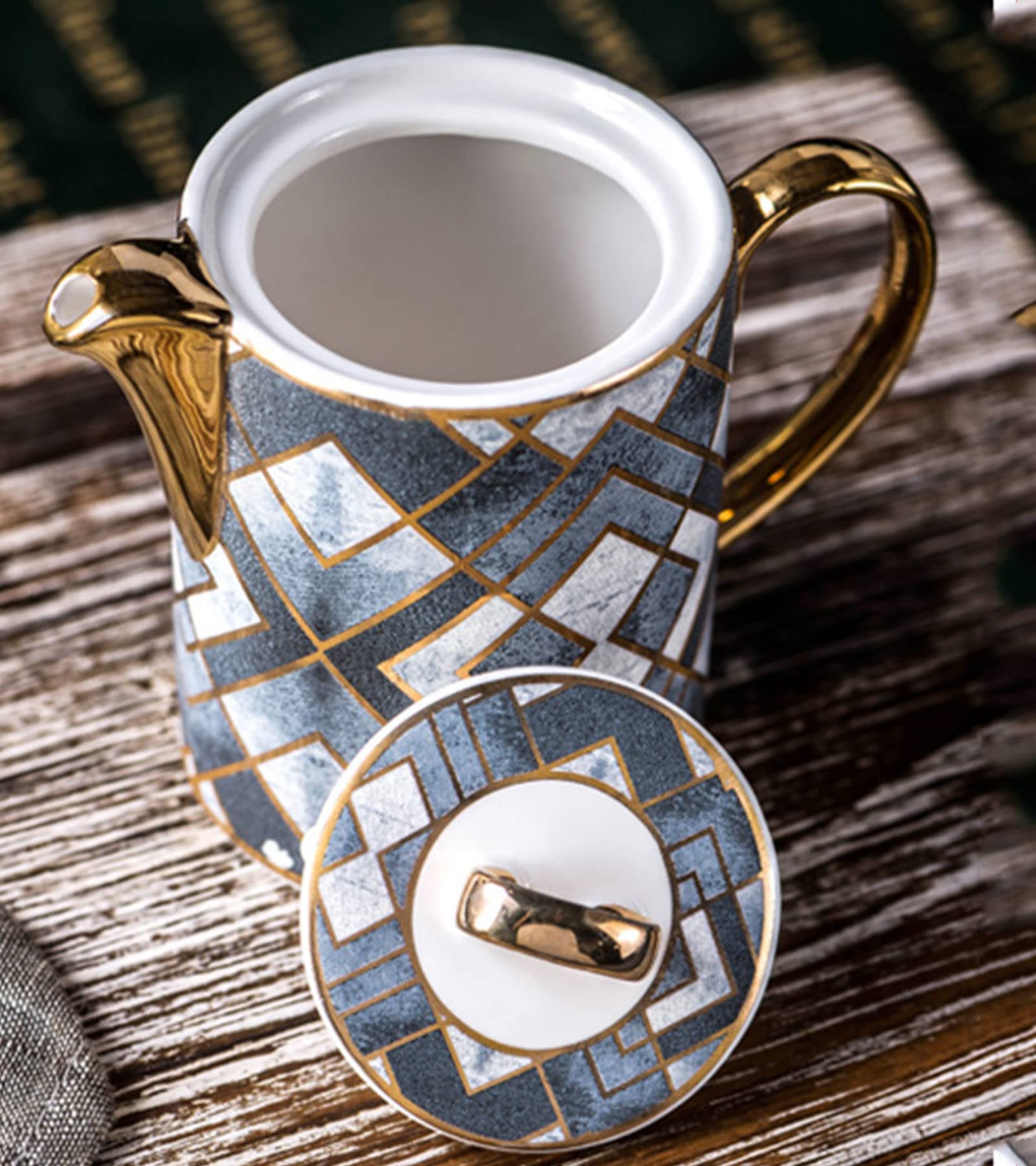 Ensemble de service comprenant un pot à lait, une saucière, un verre à eau, un pichet, un distributeur de crème et de café, un bol à sucre et à sauce en céramique avec couvercle, un pot à crème e
