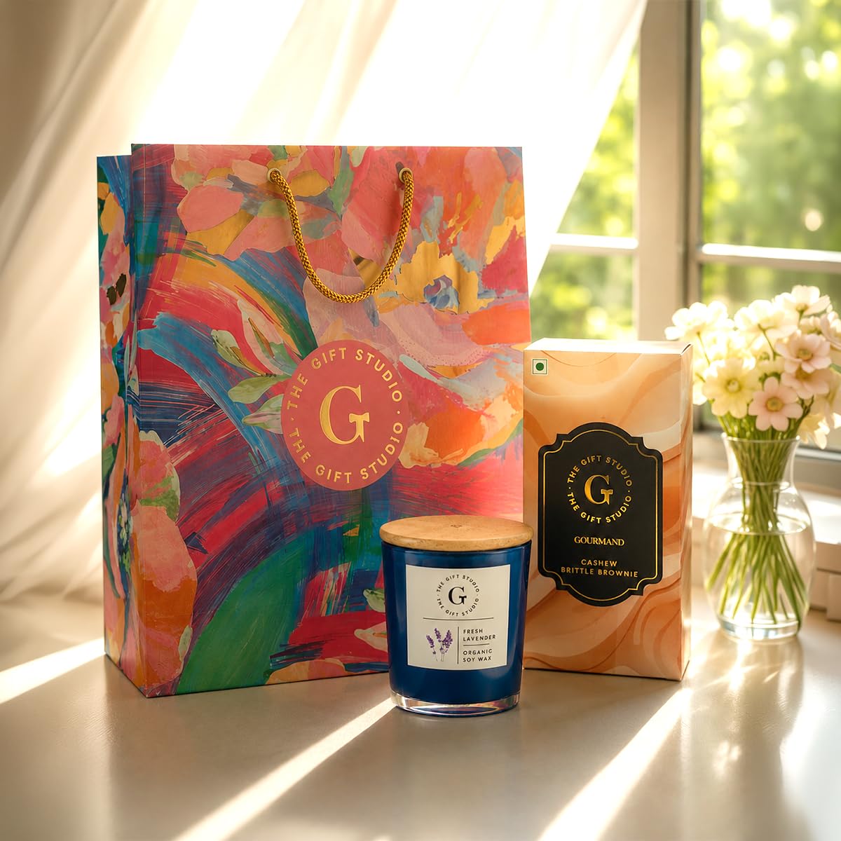 THE GIFT STUDIO.COM | Midnight Luxe Rakhi Gift Set | Midnight Blue Candle, Cashew Brittle & Floral Gift Bag | Raksha Bandhan Gift-image-14