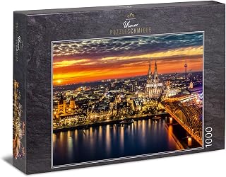 Ulmer Puzzleschmiede - Puzzle Colonia - Puzzle de 1000 Piezas - El Casco Antiguo de Colonia al Atardecer con la Catedral y el Puente Hohenzollern