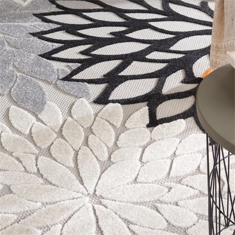 Pemberly Row 7'10" x 10'6" Black White Fabric Tropical Area Rug