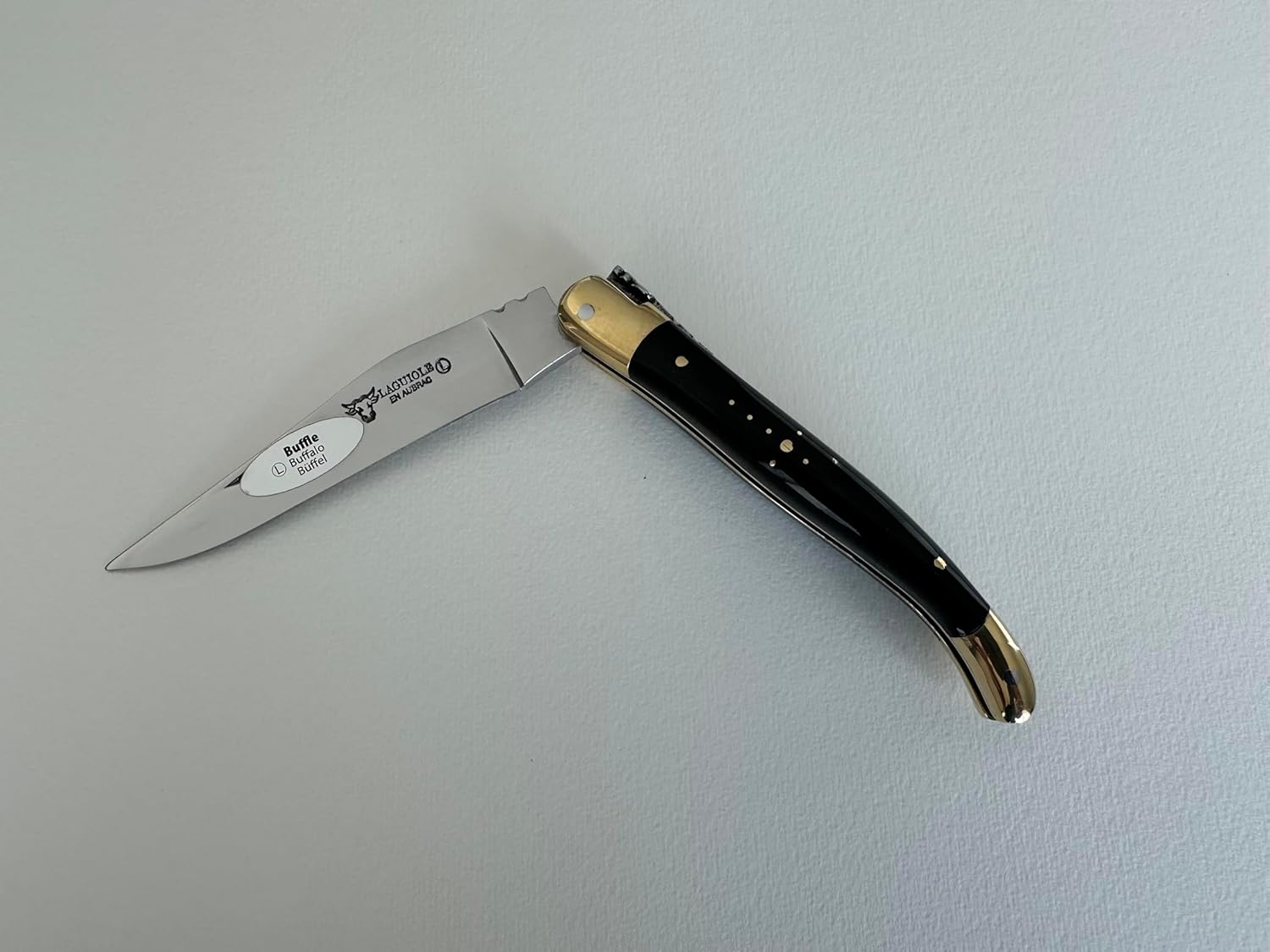 Laguiole en Aubrac Handcarved Luxury Folding Pocket Knife With Buffalo Horn Handle, 4.3-Inches (11 cm), Brass Bolster