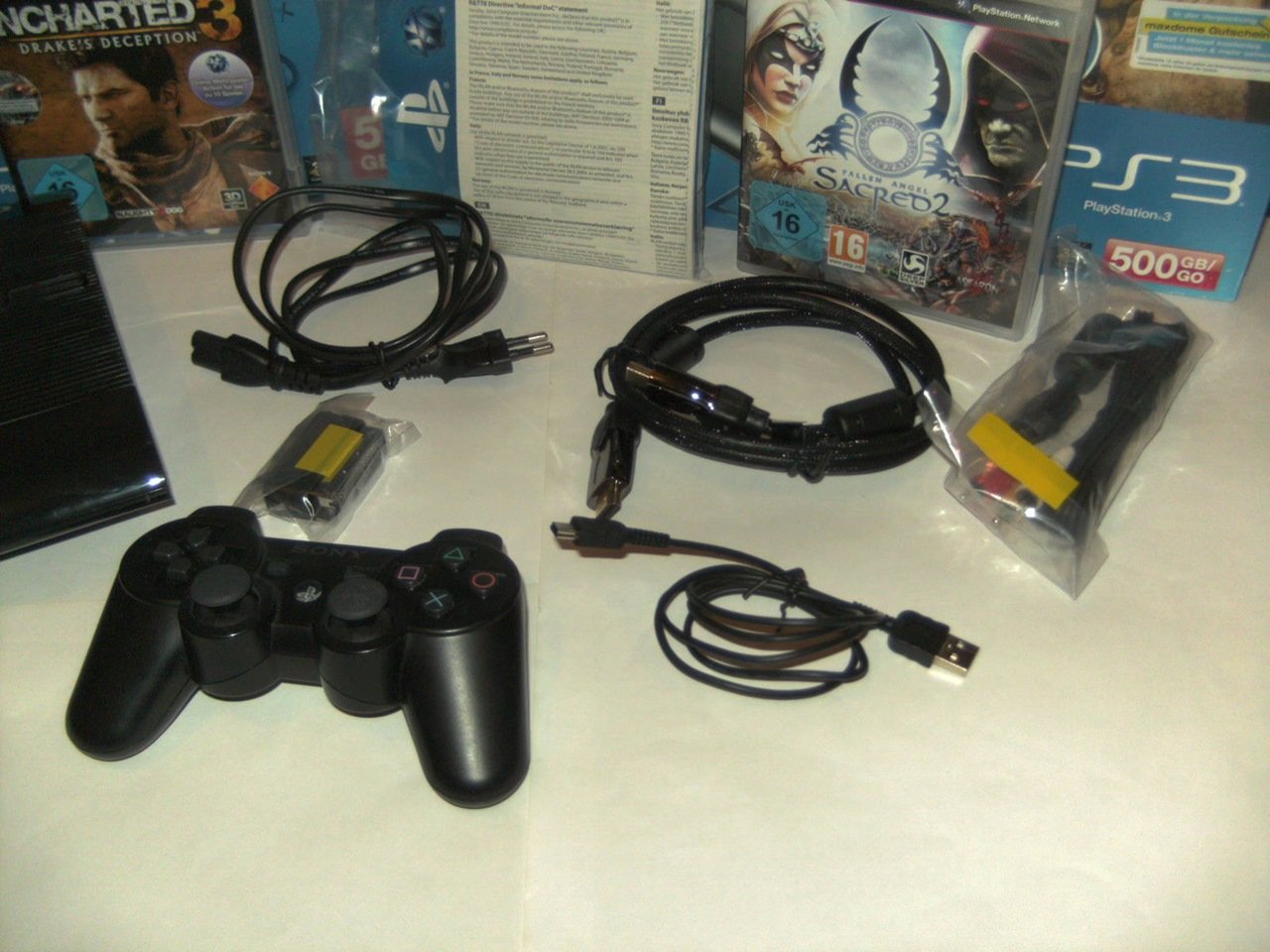 PS3 - Konsole Slim 500 GB SuperSlim + Uncharted: Drakes Deception GOTY & Gran Turismo 5: Academy Edition [Edizione: Germania]