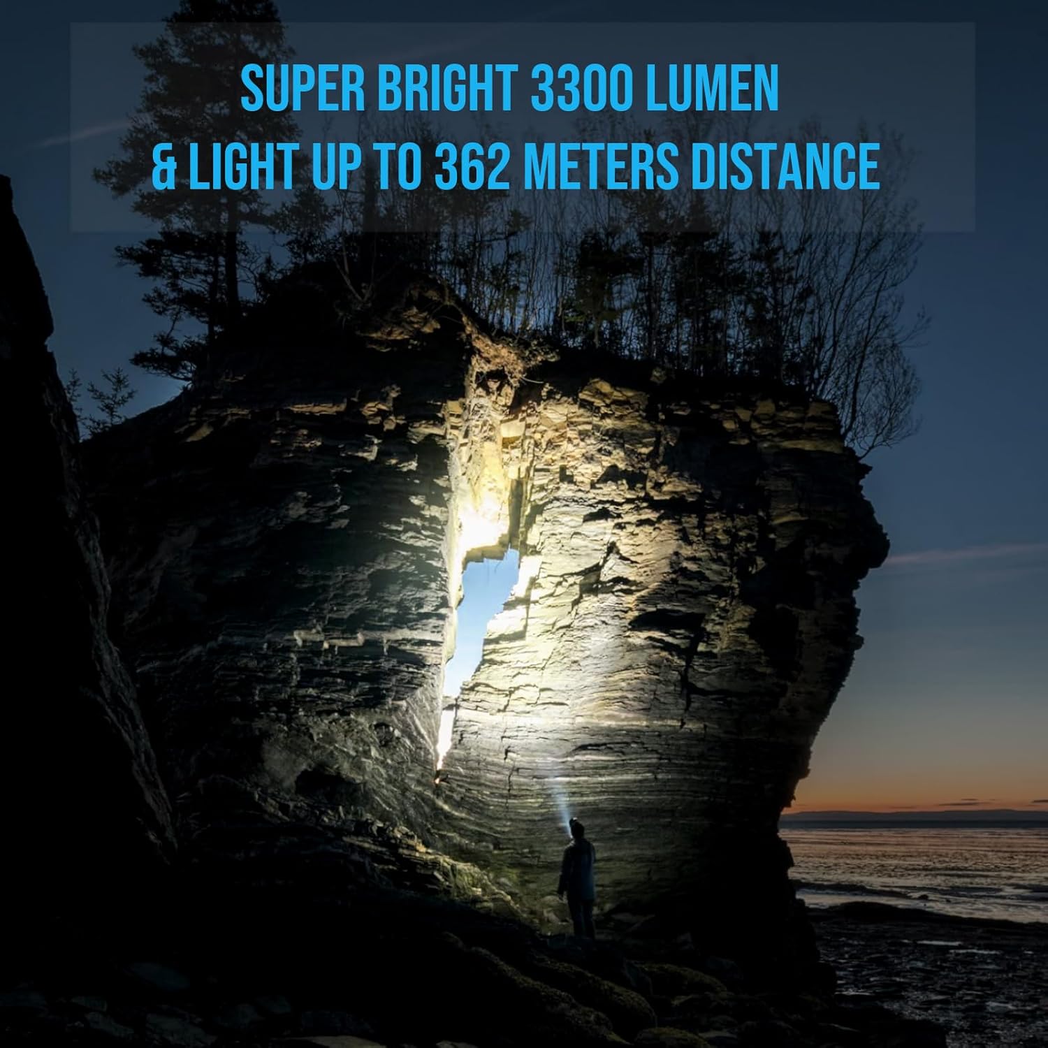 TrustFire MC5 flashlight illuminating a distant rock formation at night