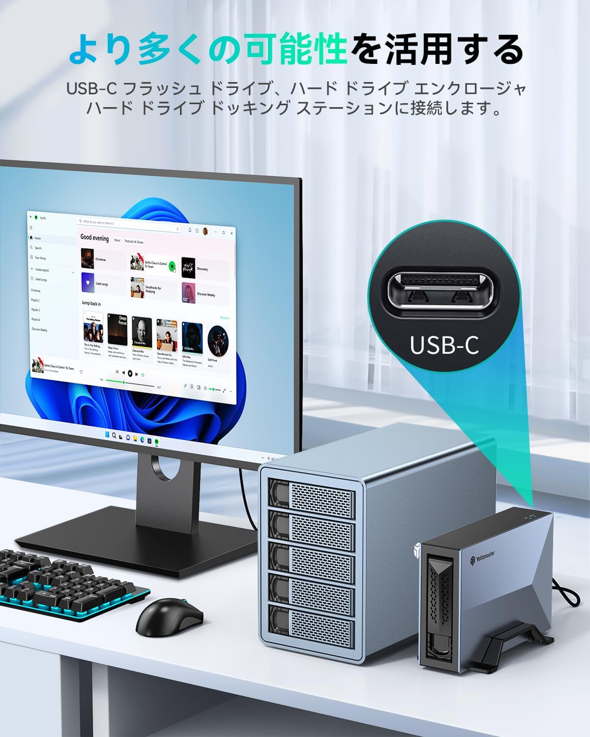 Yottamaster NAS Kit DM3 connected via USB-C to a monitor, highlighting the USB-C interface for expanded possibilities.