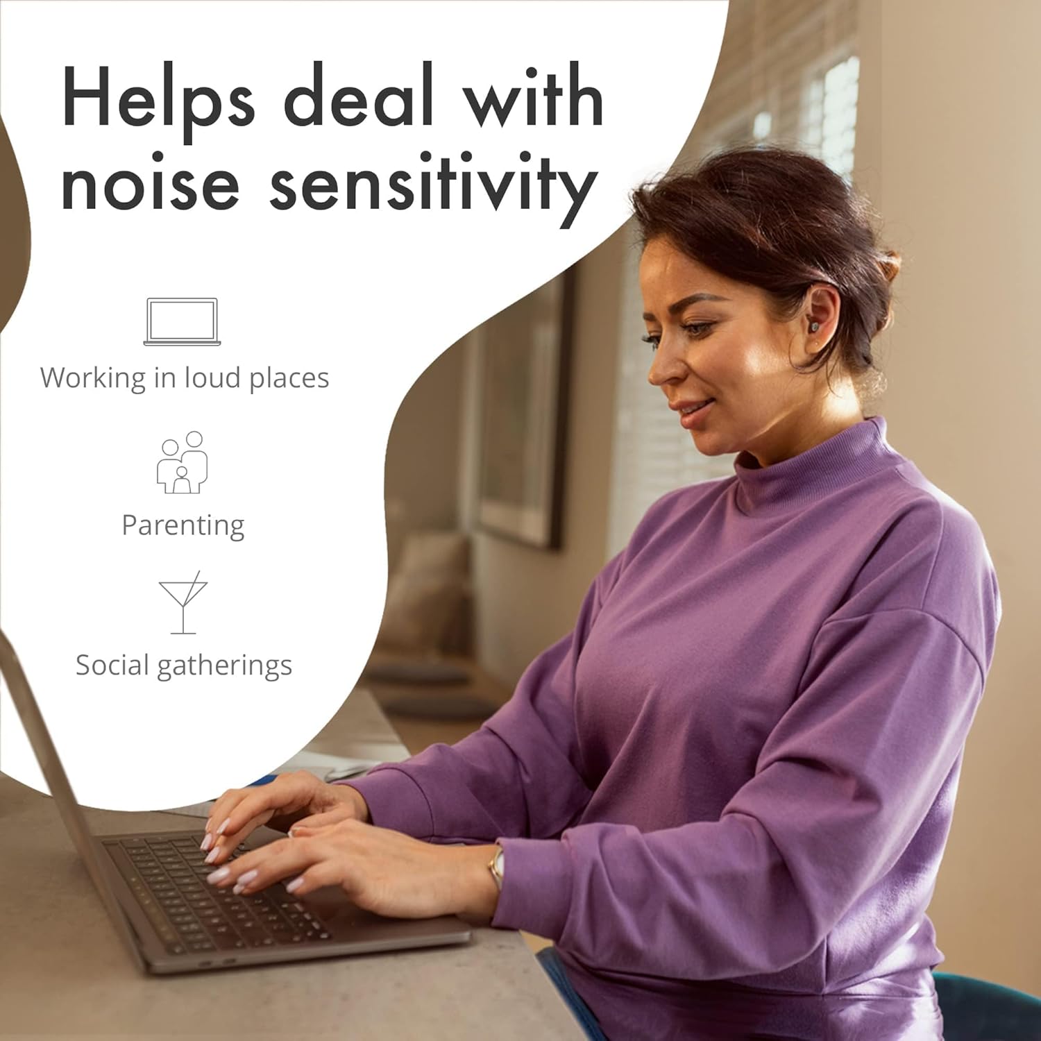 A woman working on a laptop, illustrating the use of earplugs for noise sensitivity in various settings like working in loud places, parenting, and social gatherings.