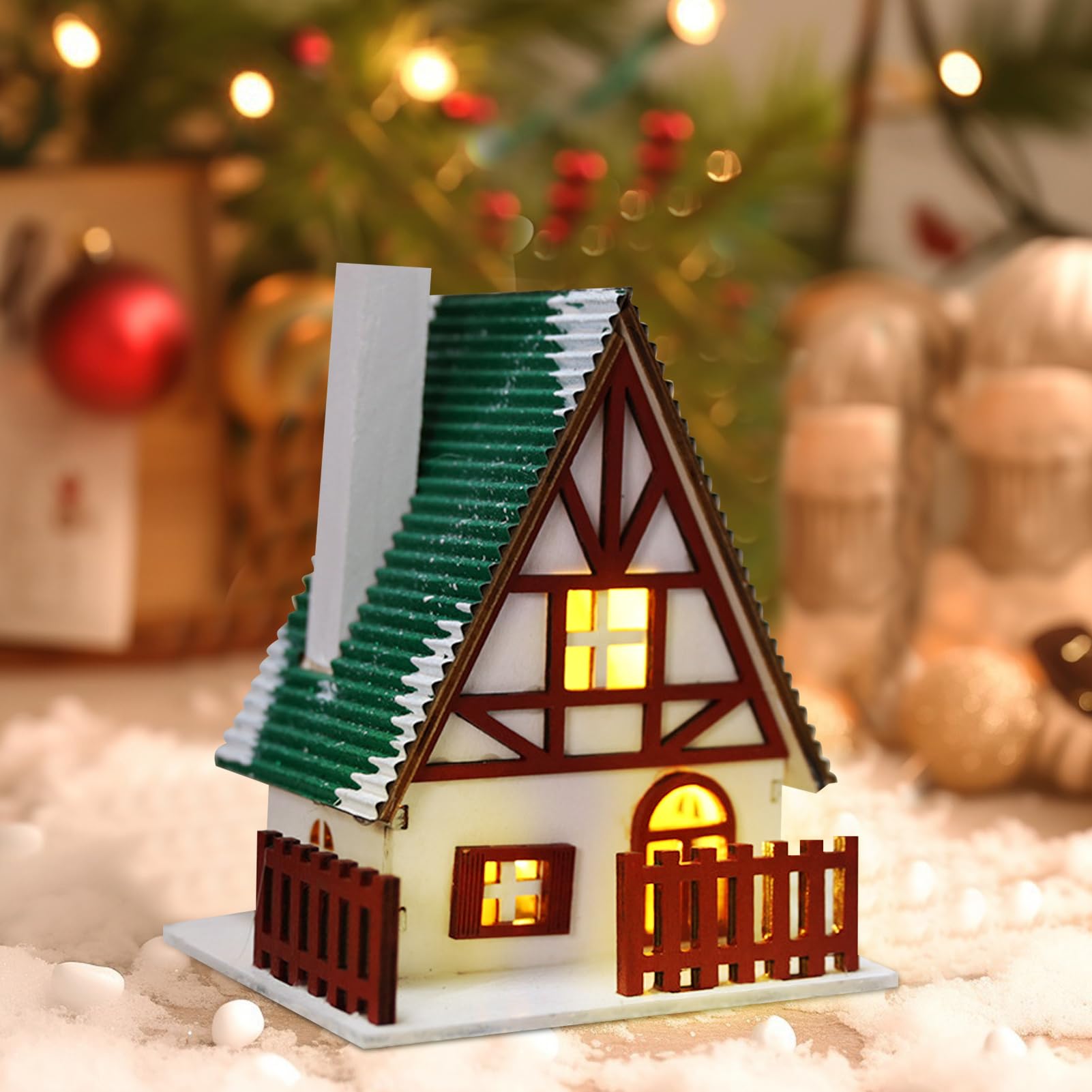 villaggio di Natale con un albero di Natale e una slitta piena di