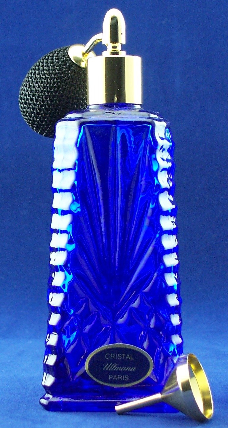 Pompon Vaporisateur triangulaire bleu cobalt avec son petit gland décoratif pour flacon