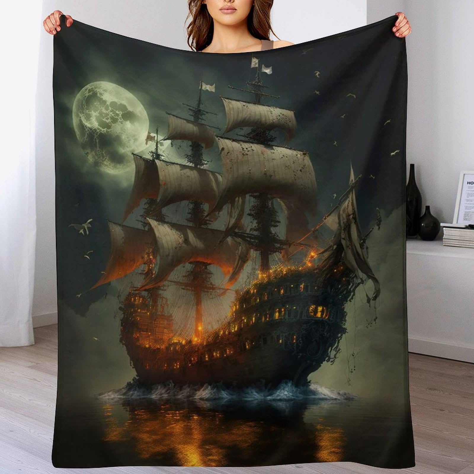 Plaid polaire bateau pirate pour des soirées cinéma cocooning confortables sur le canapé