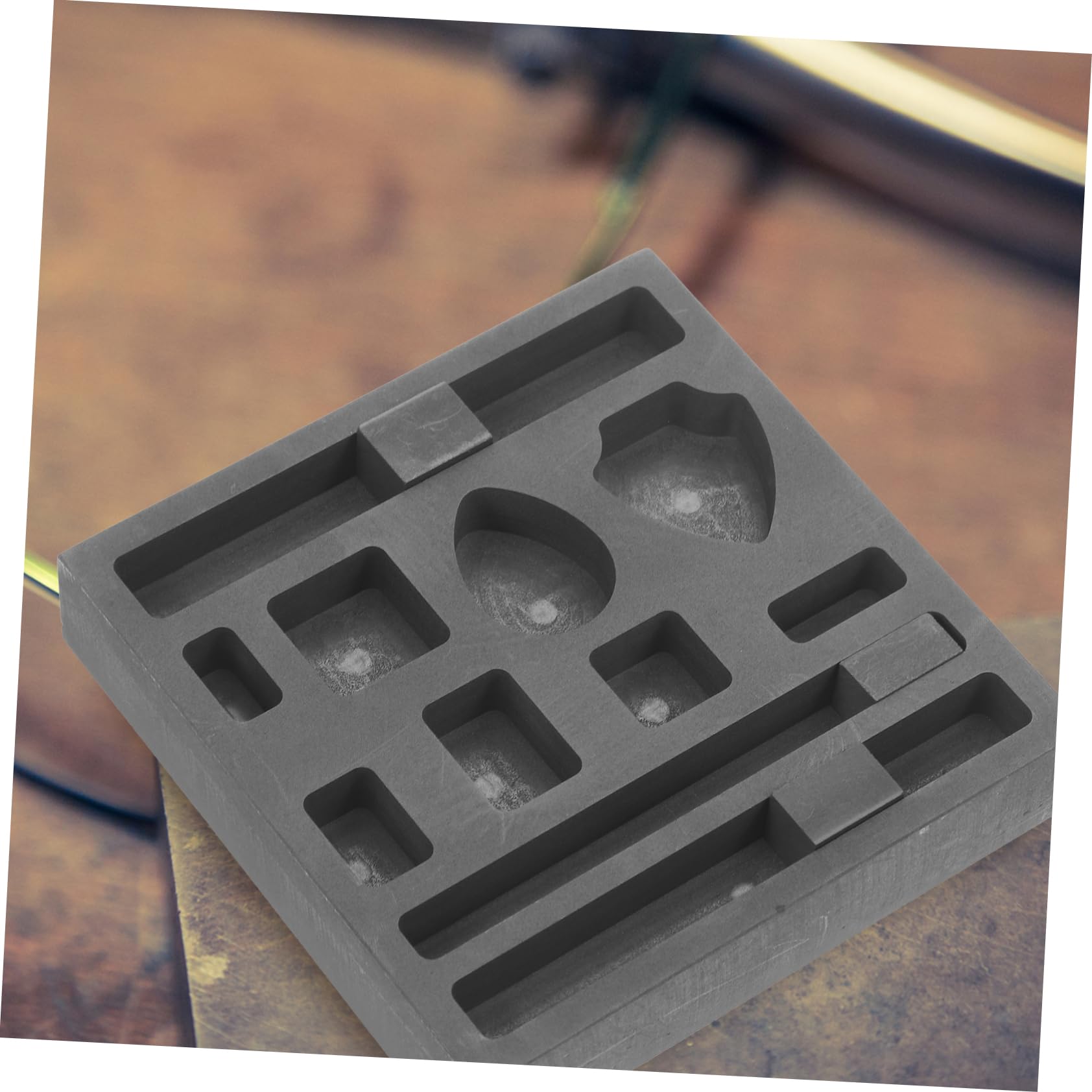 Graphitform mit 11 Löchern für Gold und Silber Beim Metallschmelzen