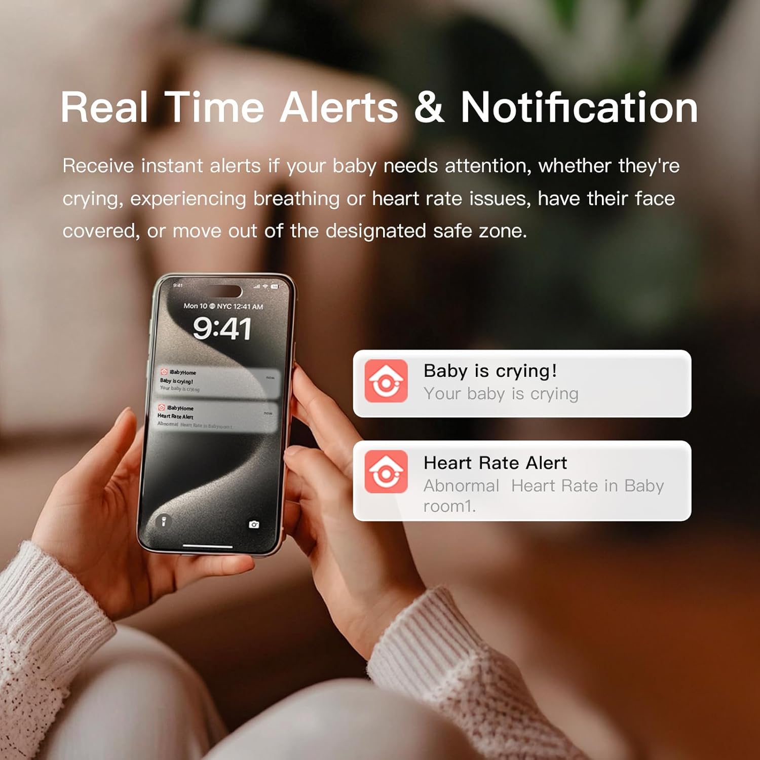 Smartphone displaying real-time alerts from the iBaby app, including 'Baby is crying!' and 'Heart Rate Alert: Abnormal Heart Rate in Babyroom1'.