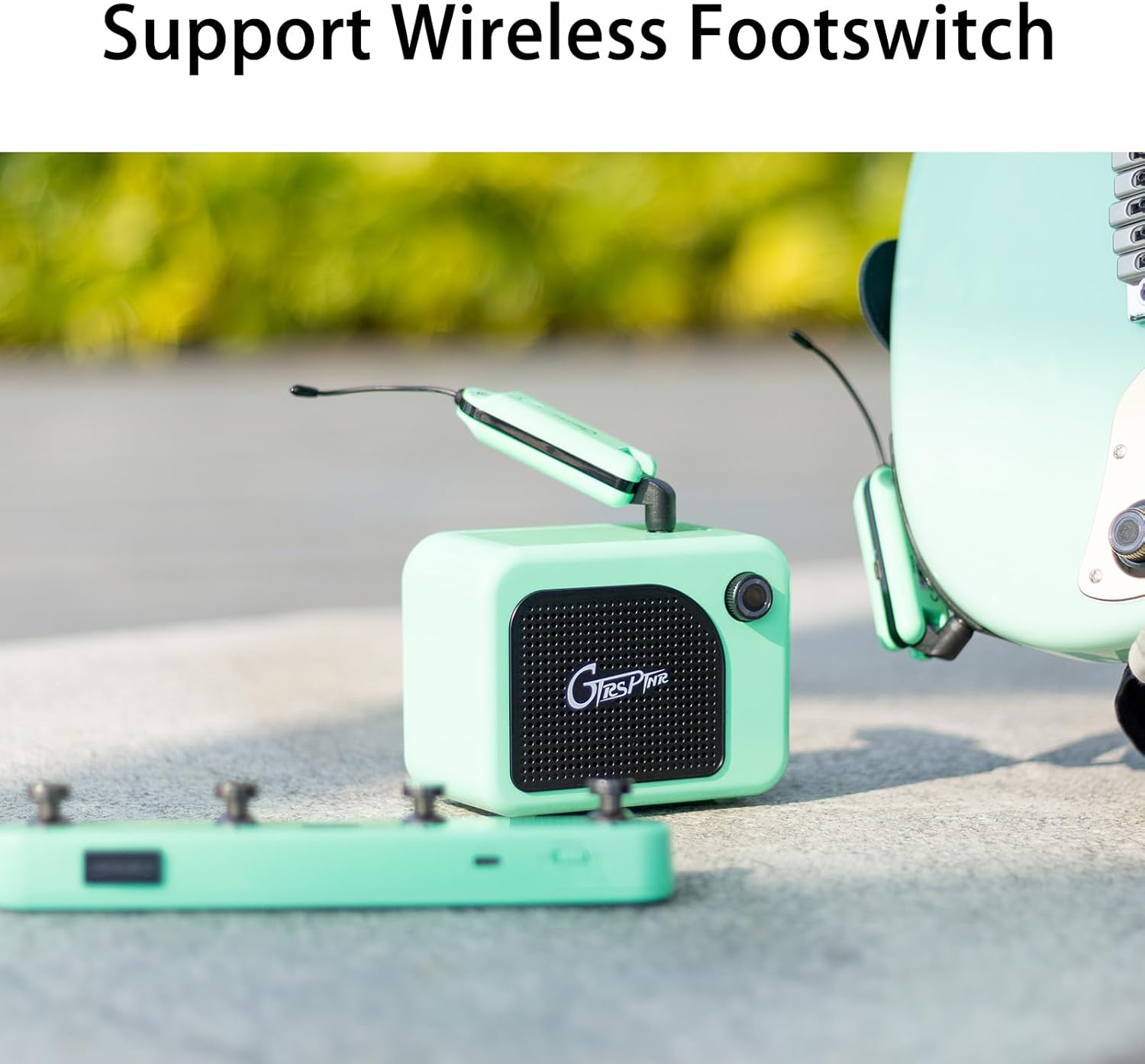 Close-up of the GTRS guitar's Super-Knob and a smartphone screen showing the GTRS app connecting via Bluetooth.