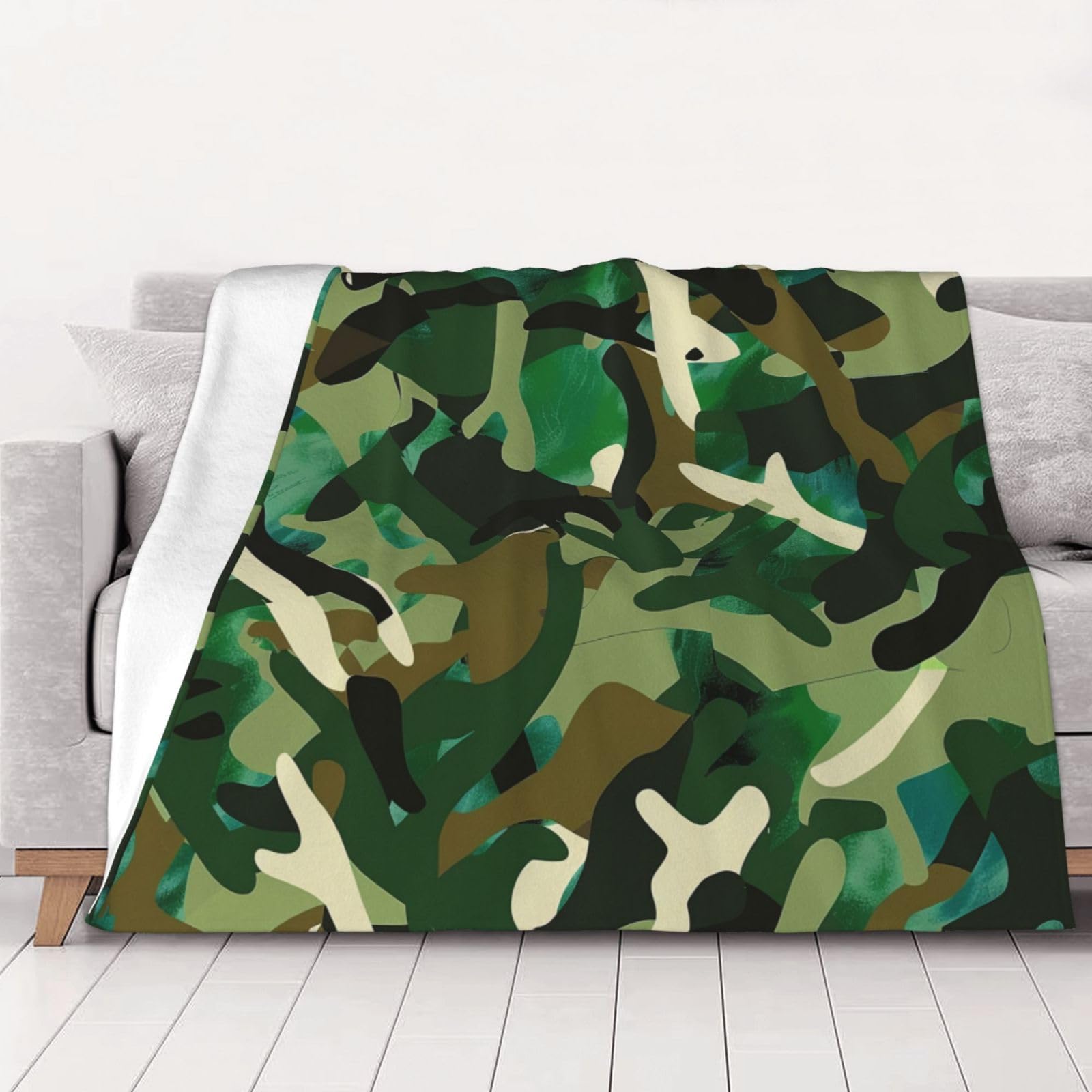 Couverture flanelle camouflage abstrait pour cocooning sur canapé