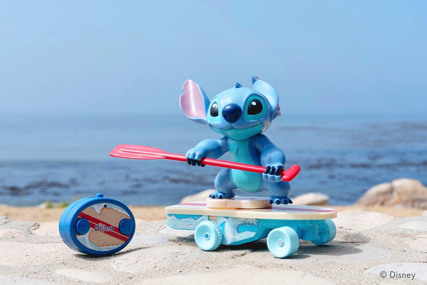 Jada Radio Control Stitch with Surfboard - 2.4 GHz - Straight Forward and Reverse Curve - 1 Channel - Integrated Figure - for Children from 3 Years - 25 cm - (253074009)