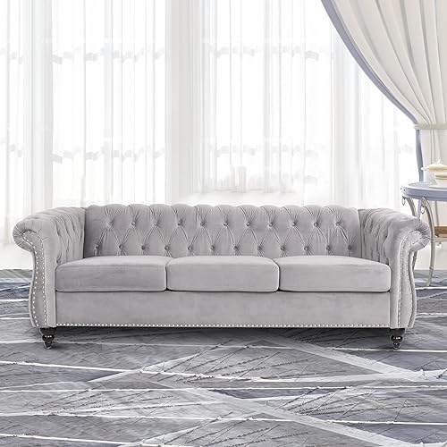gray sofa with silver studs