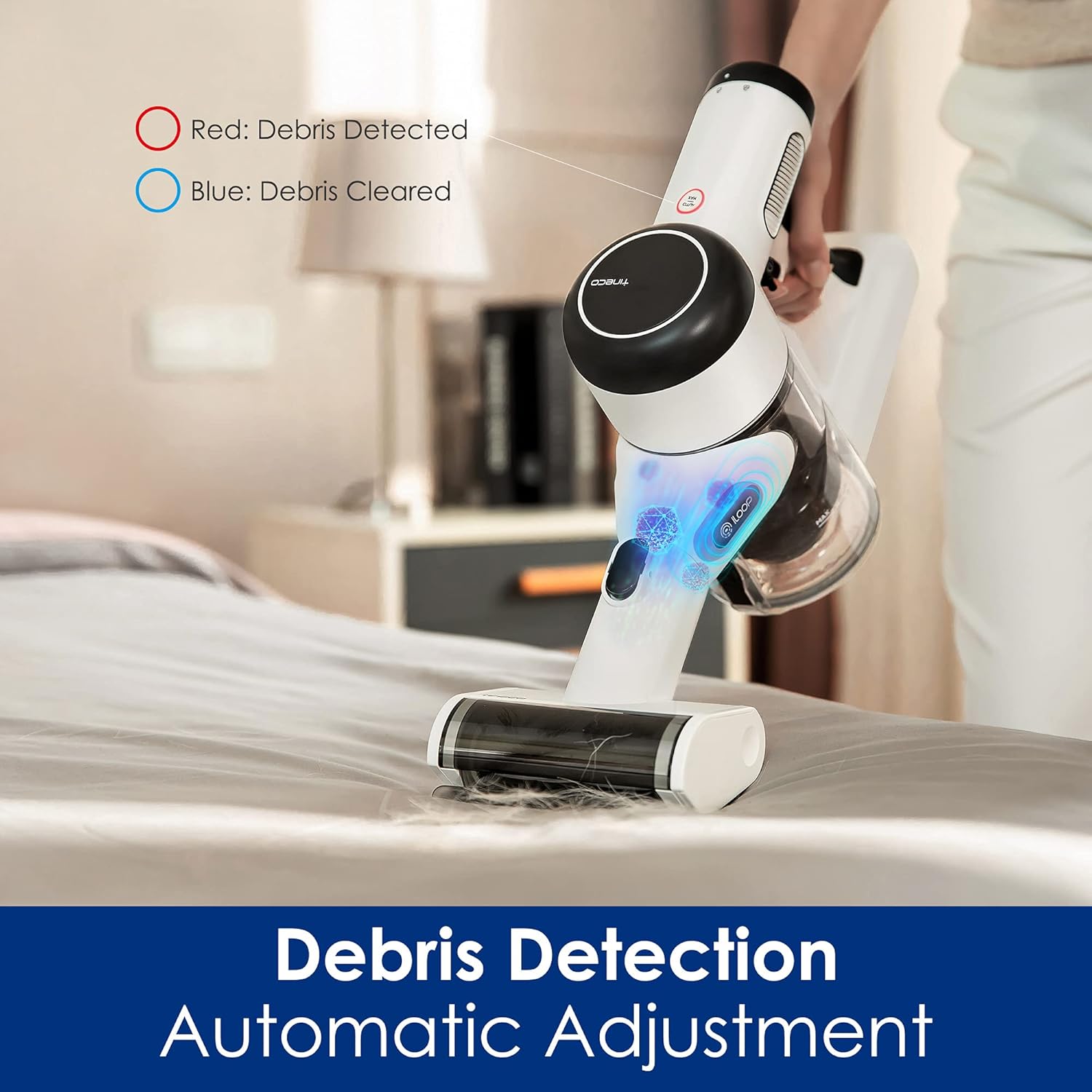 Tineco Pure ONE X vacuum head with red and blue lights indicating debris detection