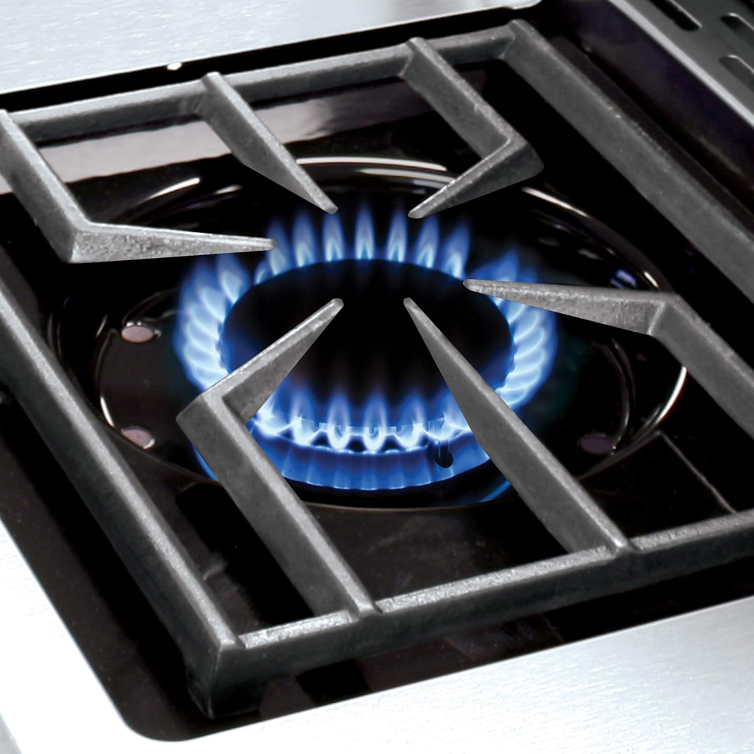 Close-up of the side burner with flame