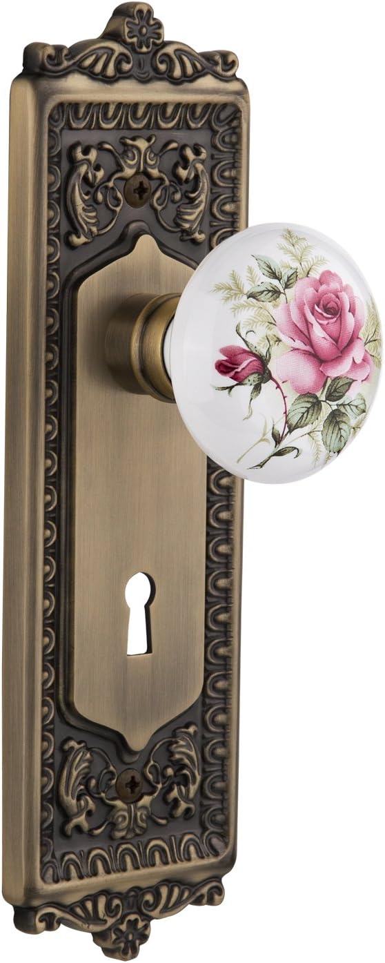 Nostalgic Warehouse Egg & Dart Plate with Keyhole White Rose Porcelain Knob, Privacy - 2.375", Polished Brass