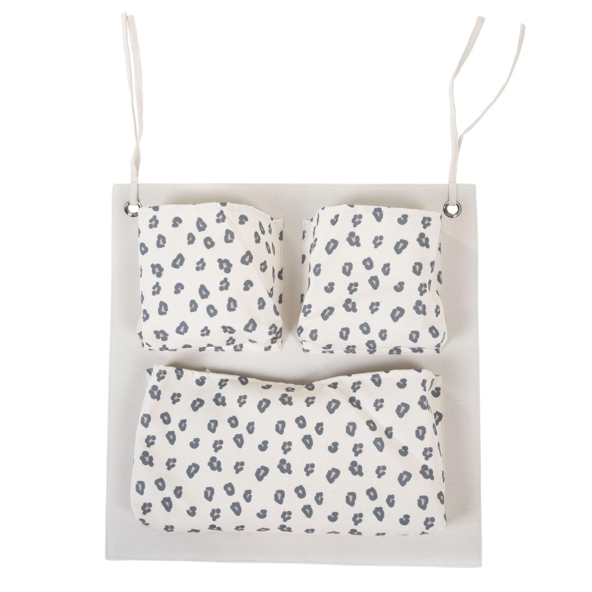 Rangement lit bébé léopard Childhome solution pochettes pour lit bébé