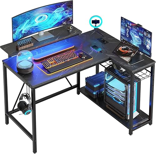 Bestier Escritorio para juegos con tomas de corriente, escritorio para juegos en forma de L de 42 pulgadas con luces LED, escritorio con estantes de