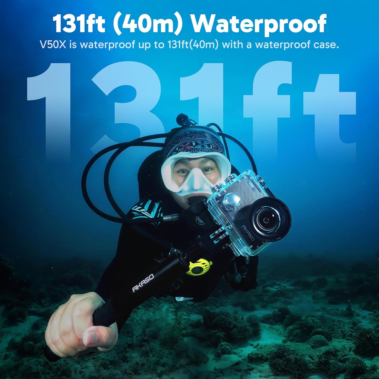 Person diving underwater with AKASO V50X in waterproof case
