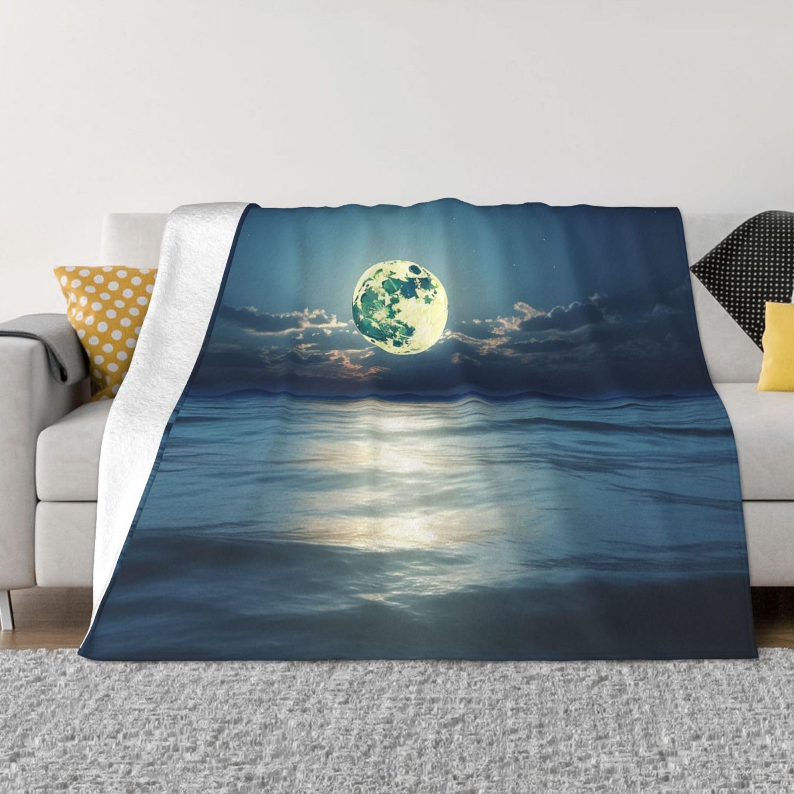 Couverture polaire lune et mer en flanelle : l'idée cadeau idéale pour un hiver cocooning