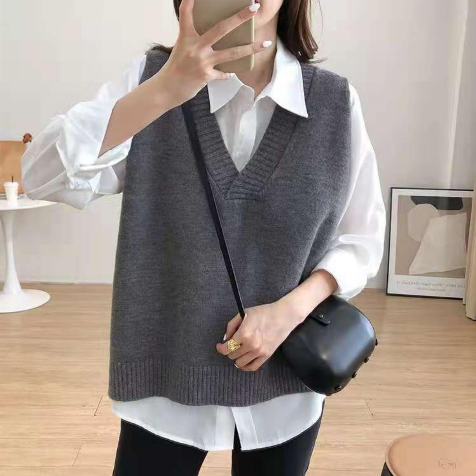 Dawwoti Femme Pulls sans Manches Col V Gilet Sweat Tricot Gilet Top Ourlet irrégulier Couleur Unie