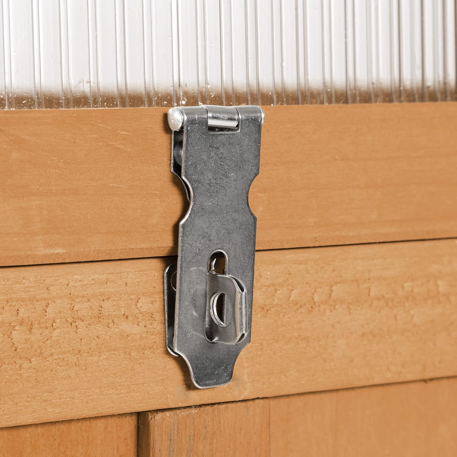 Close-up of a latch on the cold frame