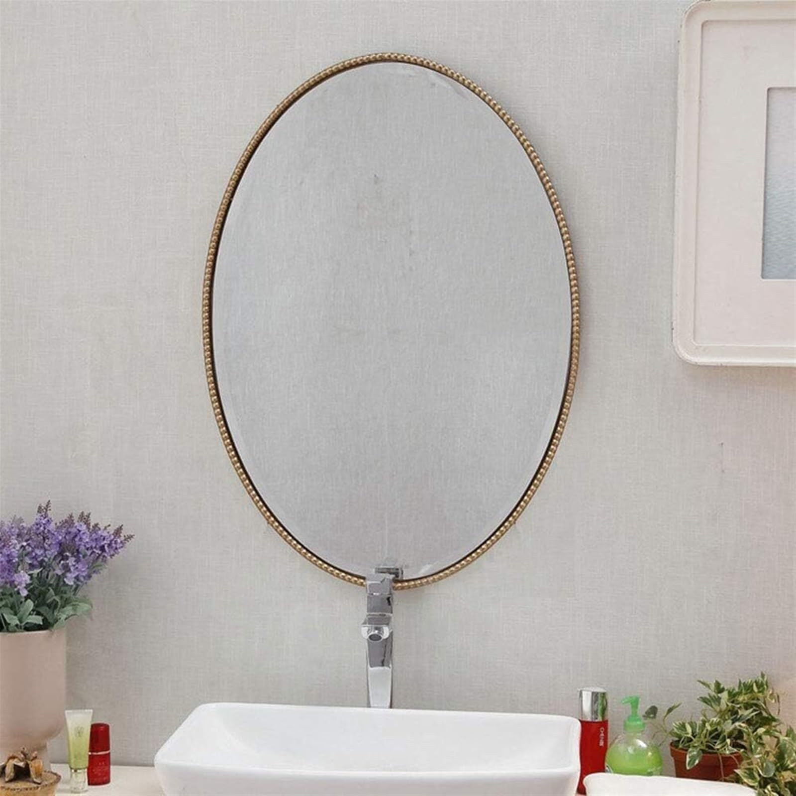 Miroir mural ovale de style rétro avec moulure perlée élégante
