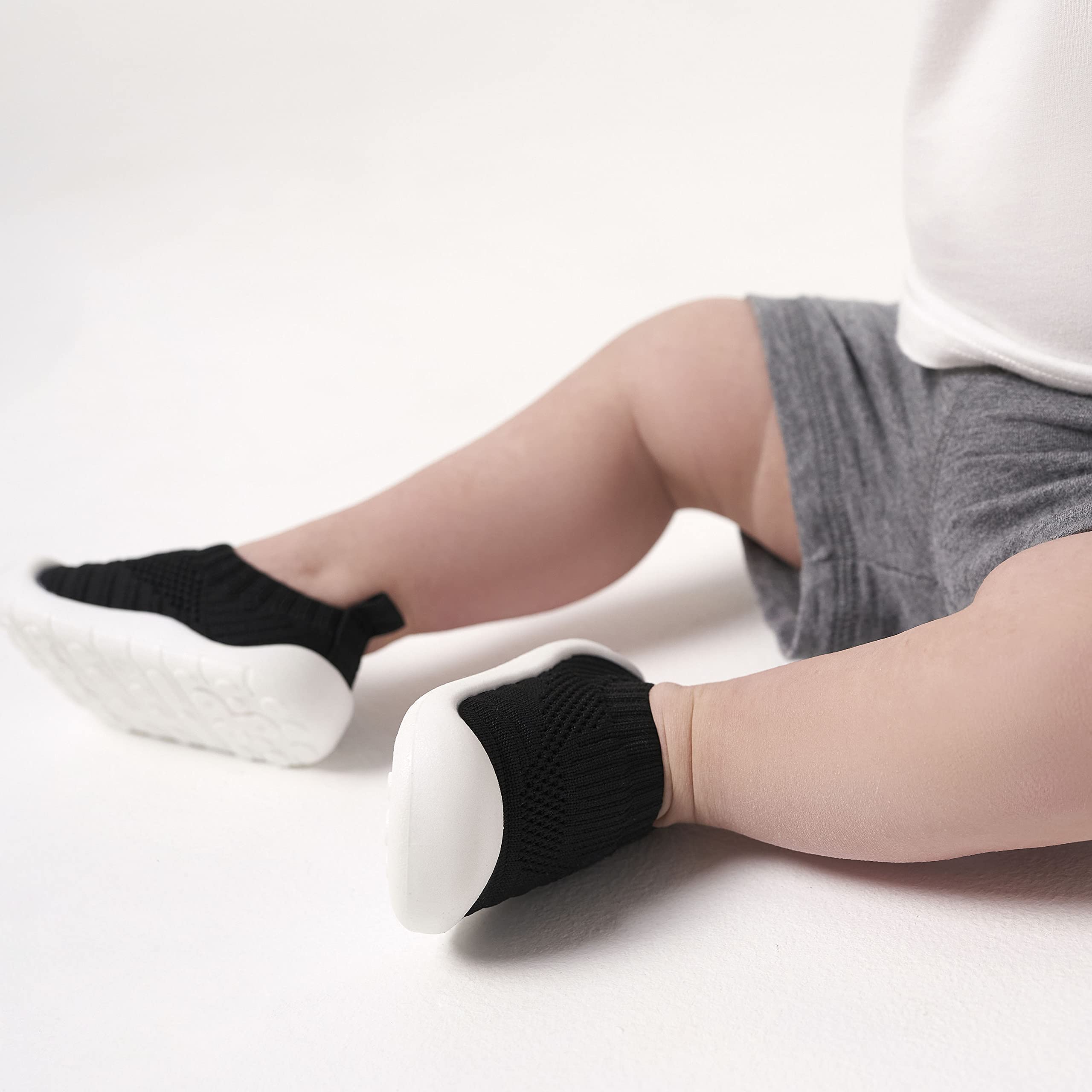 Gerber Baby Toddler Boy and Girl Stretchy Knit Slip-On Sneaker Crib Shoe, Black, 0 3 Months Unisex Infant