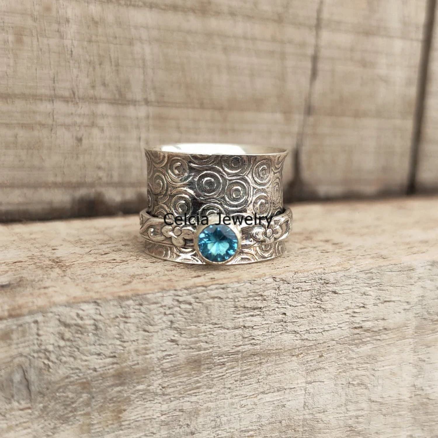 Anillo giratorio de plata facetado con piedra preciosa redonda de topacio azul para meditación y ansiedad